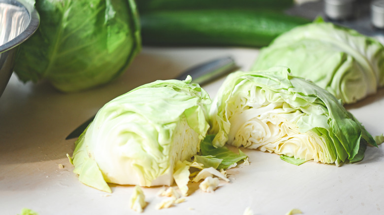 A cabbage head sliced in half