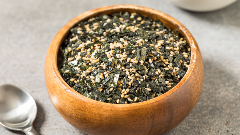 A wooden bowl filled with furikake