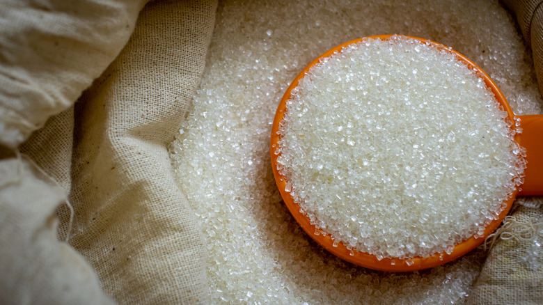 Cane sugar with a scoop