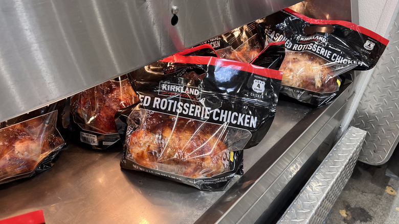 Rotisserie chickens in the warming shelf at Costco