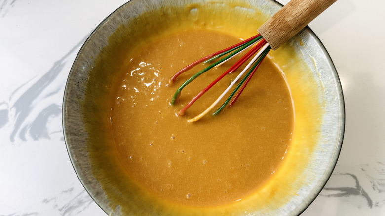 Caramel sauce and whisk in bowl