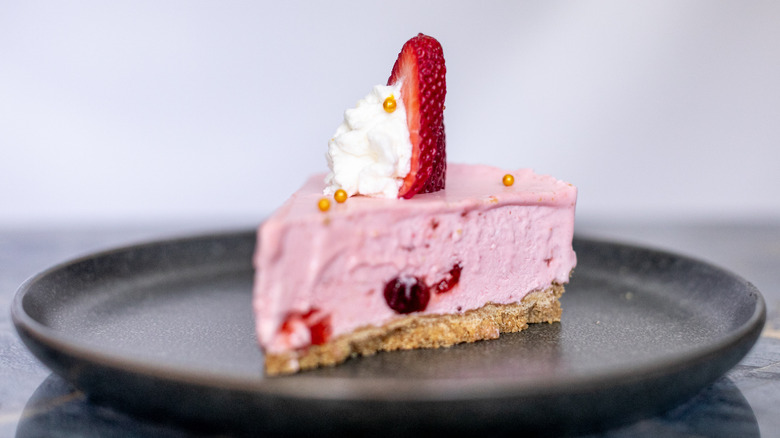 A slice of No-Bake Strawberry Cheesecake on a plate