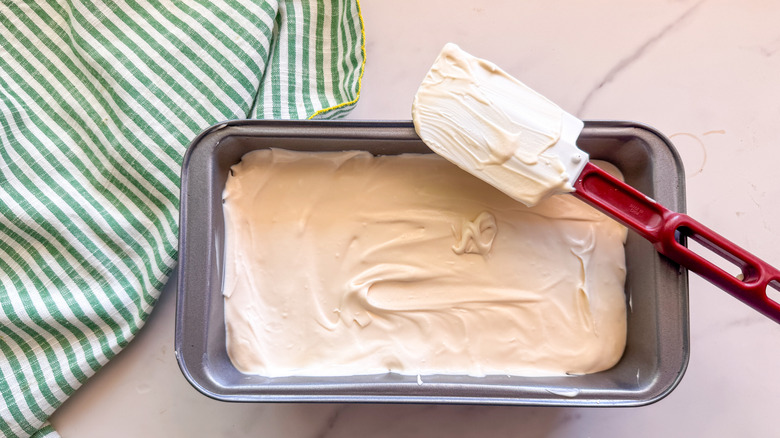 ice cream mixture smoothed out in loaf pan