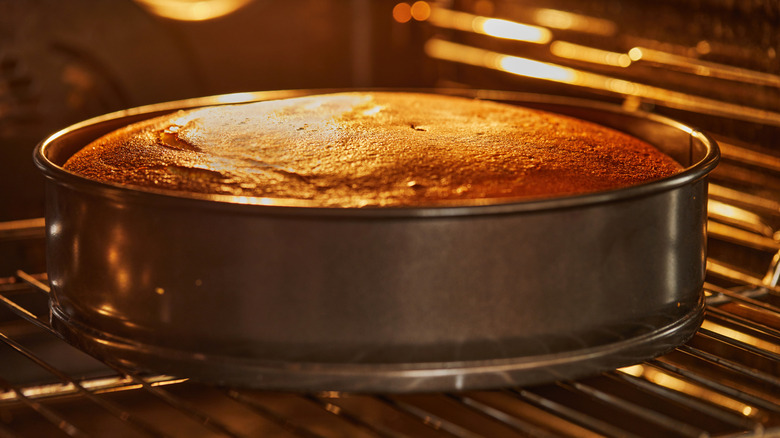 A close-up of a cake pan in the oven