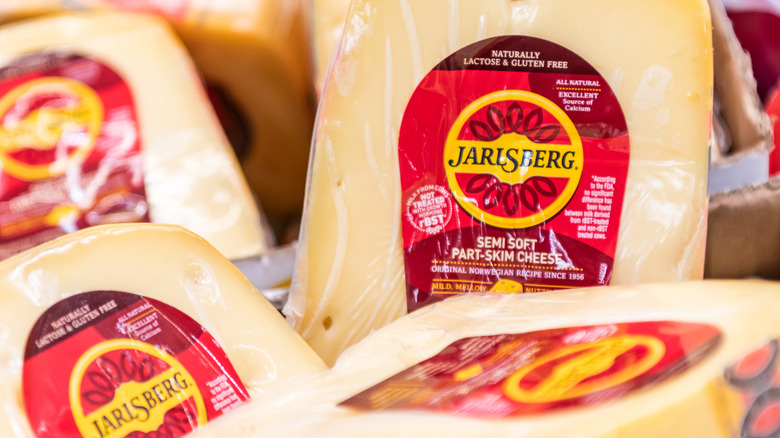 Closeup of packaged Jarlsberg cheese in soft focus
