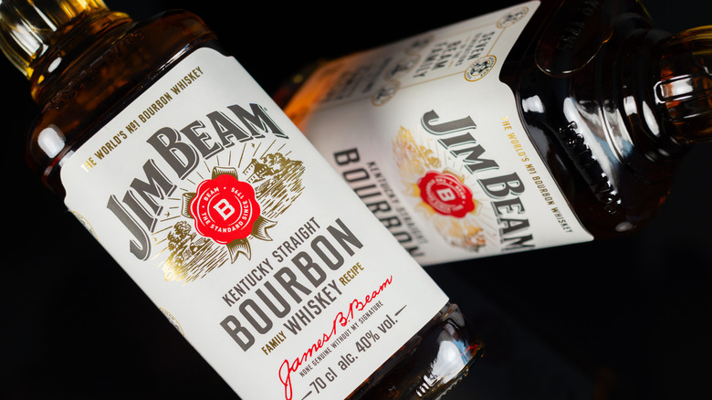 Two criss-crossed Jim Beam bottles