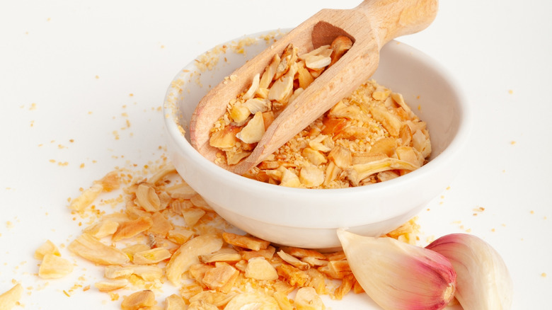 A bowl overflowing with garlic chips