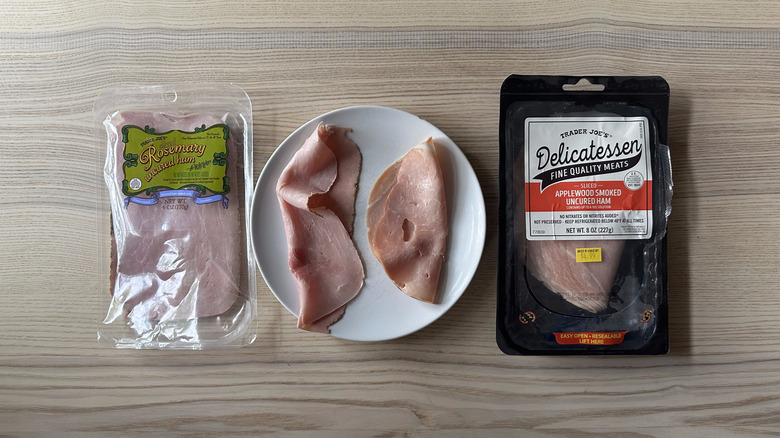 two packages of Trader Joe's deli ham with plate between them