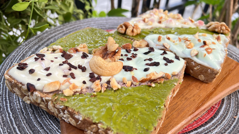 Slices of matcha butter toast on wood