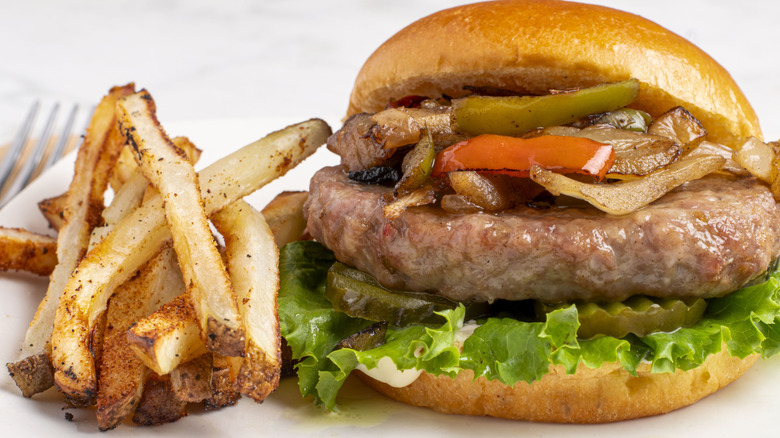 Burger with roasted red peppers on top