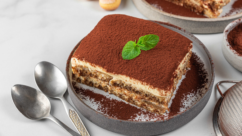 Close up of a slice of tiramisu cake from a restaurant