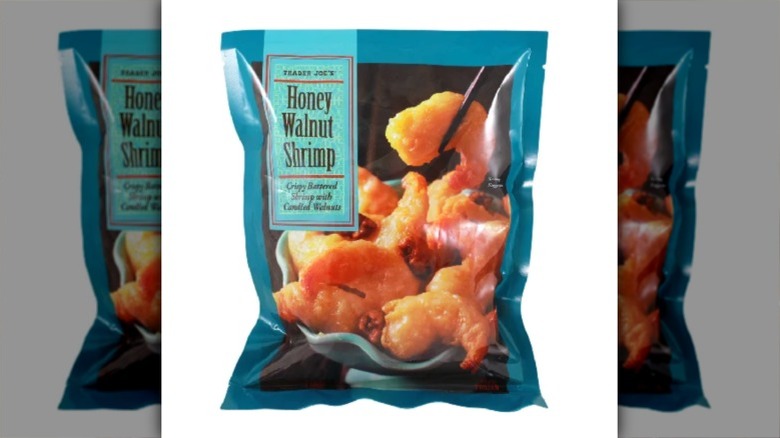 A plate of Honey Walnut Shrimp served over cabbage
