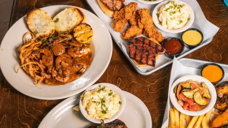 Logan's Roadhouse menu items on table