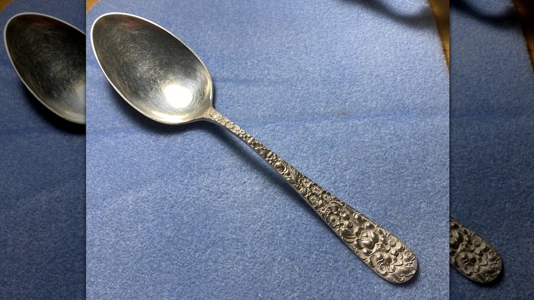 Closeup of a Stieff Sterling Silver Rose collection spoon