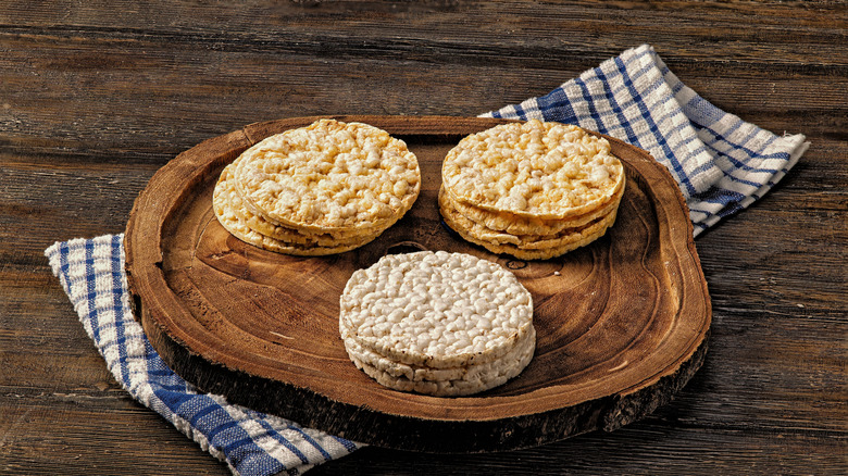 assorted flavors of rice cakes ohn a wood board