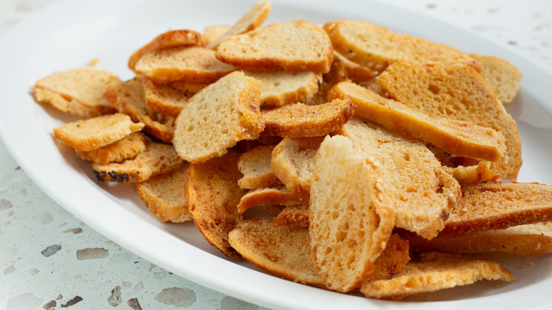 A plate piled high with crispy bagel chips