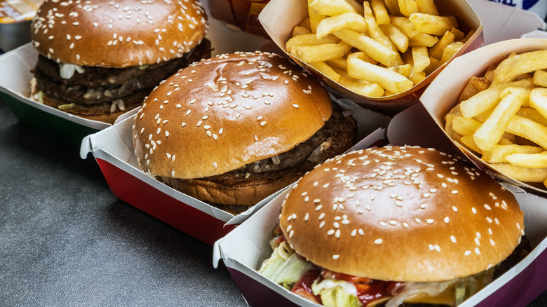 Various McDonald's burgers with fries