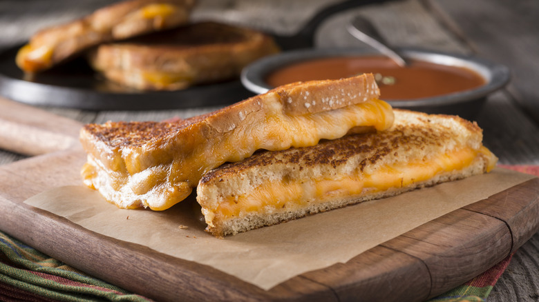 A grilled cheese sandwich sliced in half