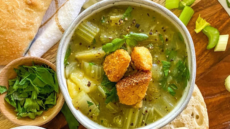 A bowl of Instant Pot celery soup with croutons