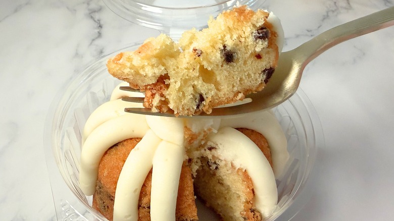 Nothing Bundt Cakes Gluten-Free Chocolate Chip Cookie cake piece on fork above bundtlet