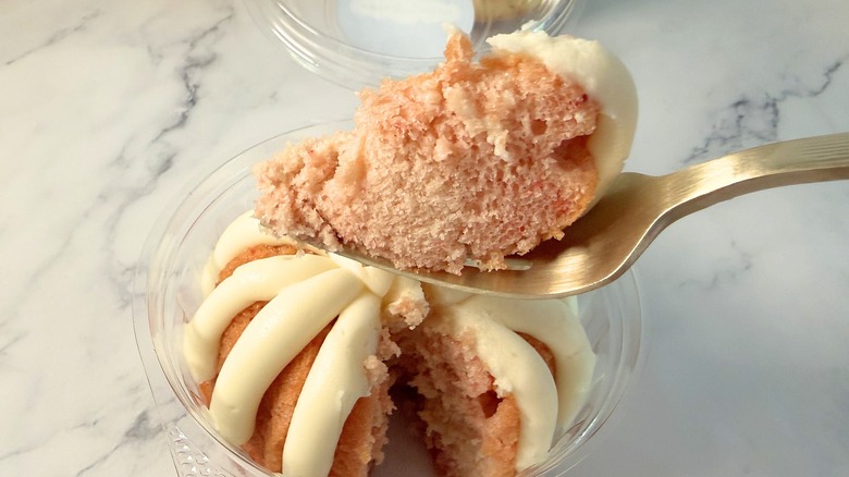 Nothing Bundt Cakes Strawberries & Cream cake piece on fork above bundtlet