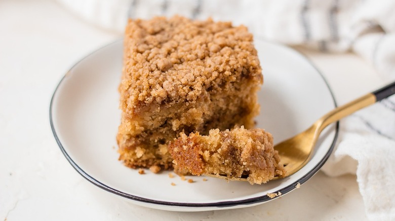 slice coffee cake with fork