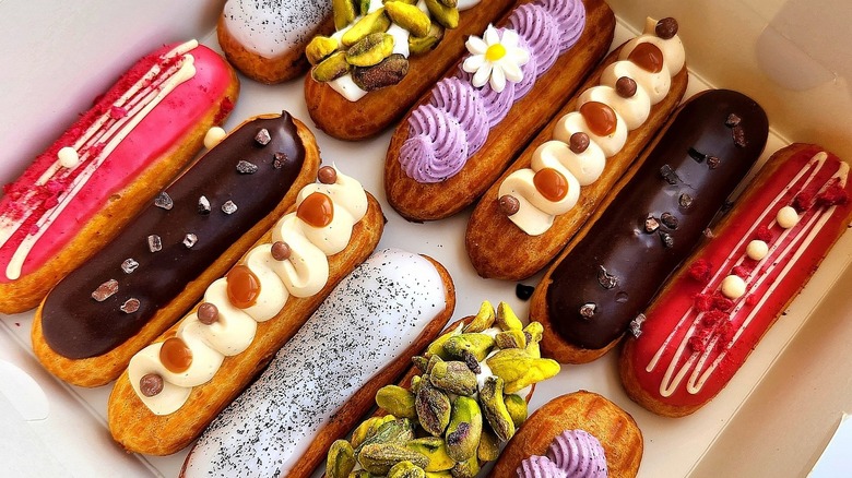 a variety box of colorful eclairs
