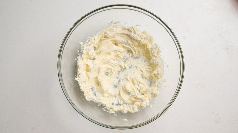 beaten cream cheese in a bowl