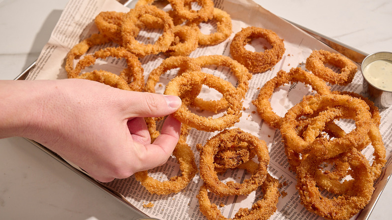 onion rings on a paper lined tray