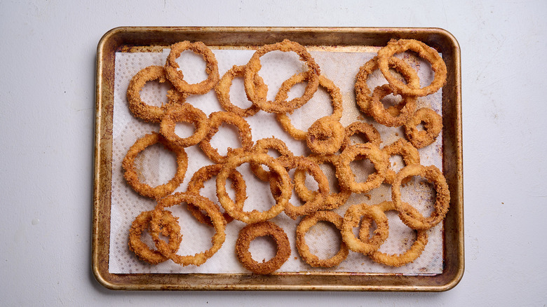 onion rings on paper towel lined tray
