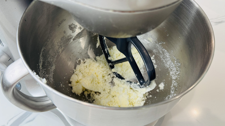 Butter and sugar in mixing bowl