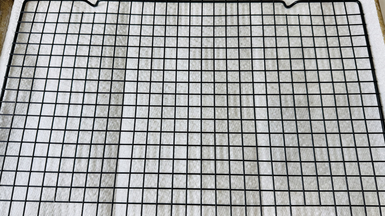 Cooling rack set over lined baking sheet