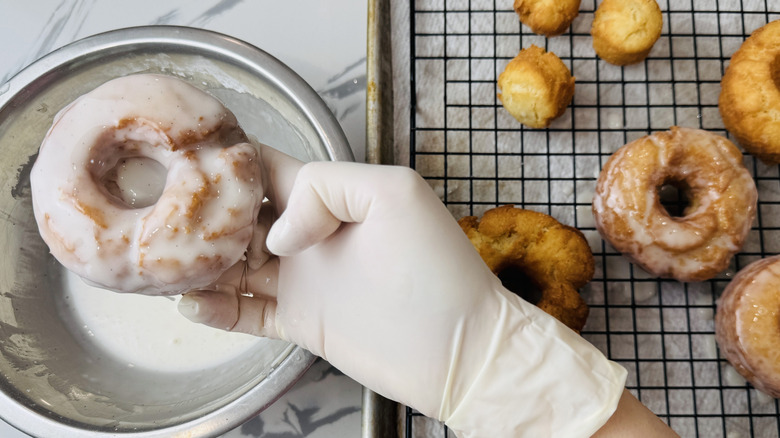 Glazing old-fashioned doughnuts