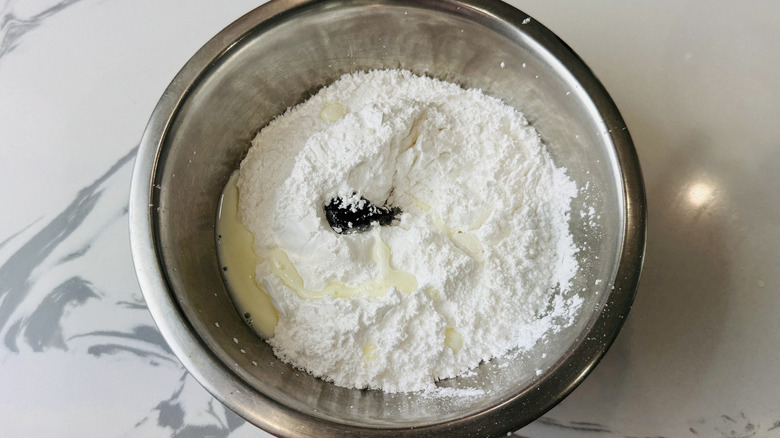 Doughnut glaze ingredients in mixing bowl