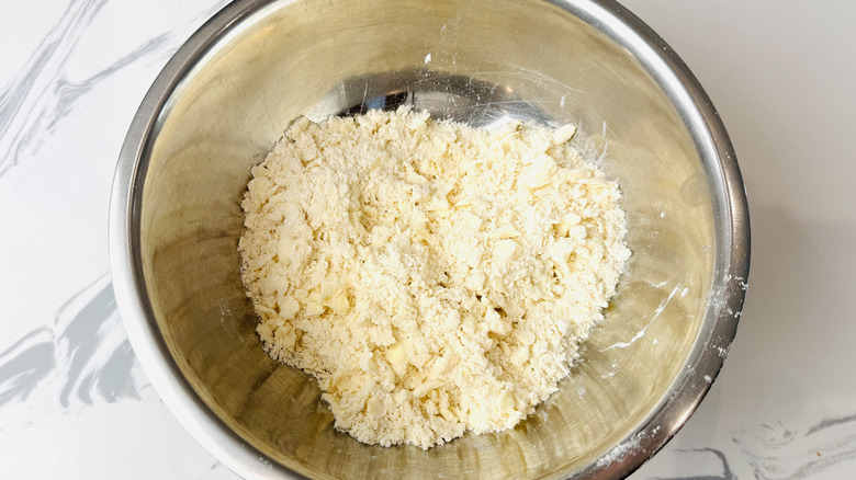 Preparing pie crust in a bowl