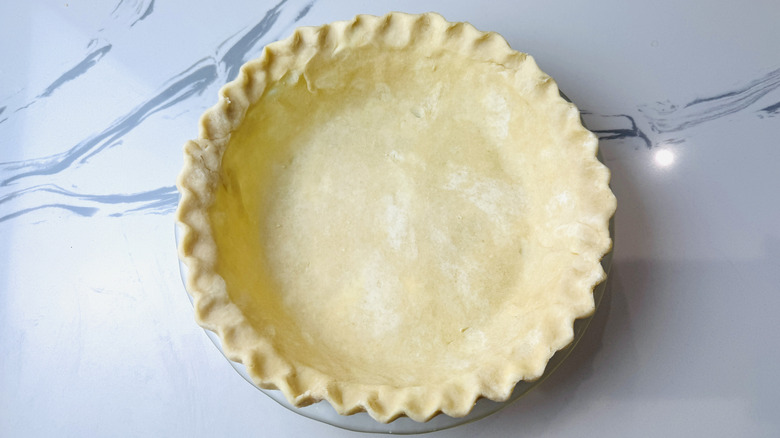 Crimped pie crust in pie plate