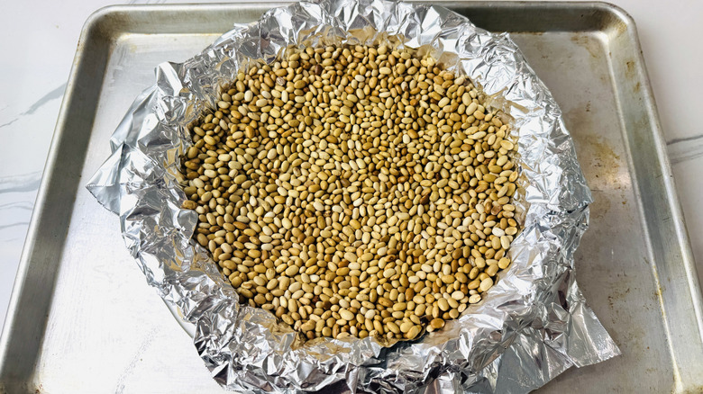 Pie weights in a lined pie crust