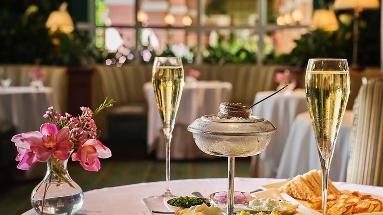 Table at The Polo Lounge with champagne and beautiful decor