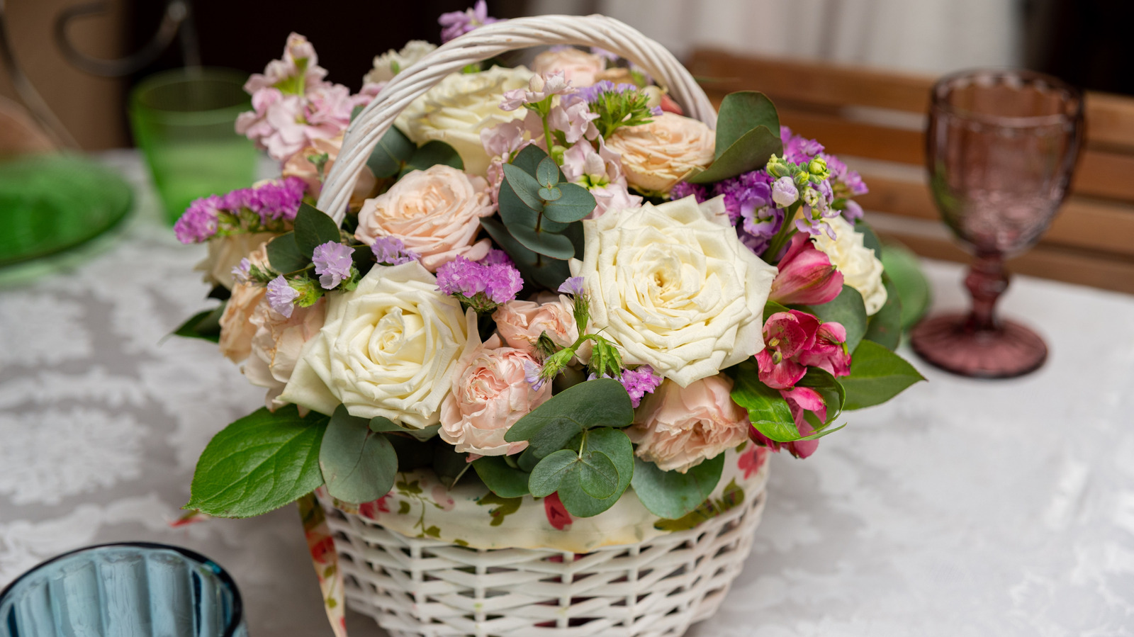 Turn Old Mason Jars Into A Beautiful Centerpiece Using A Basket And Flowers