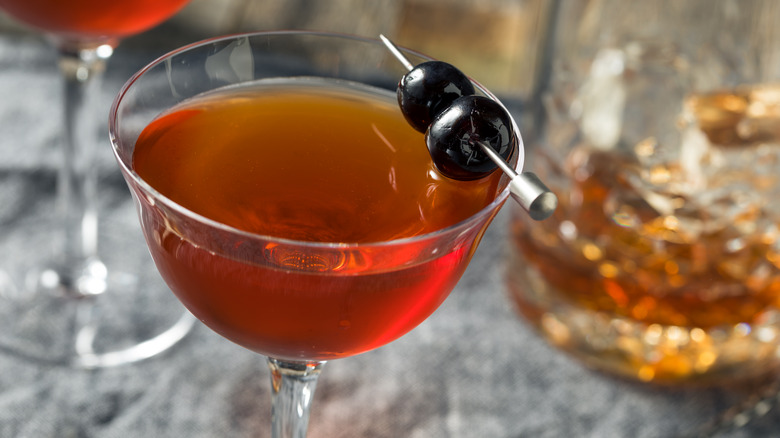 Rob Roy in cocktail glass with cherry garnish
