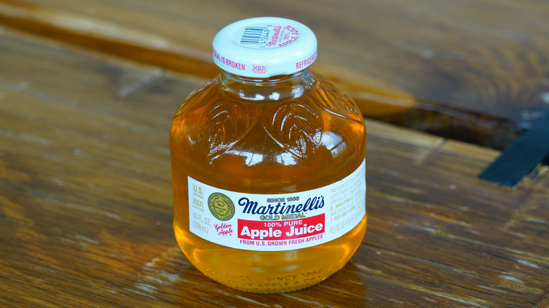 A small jar of apple juice