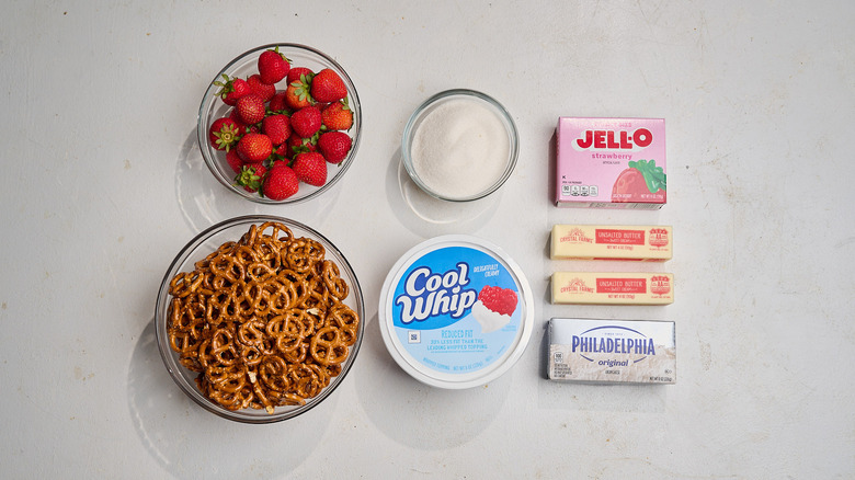 Strawberry pretzel salad ingredients on a table
