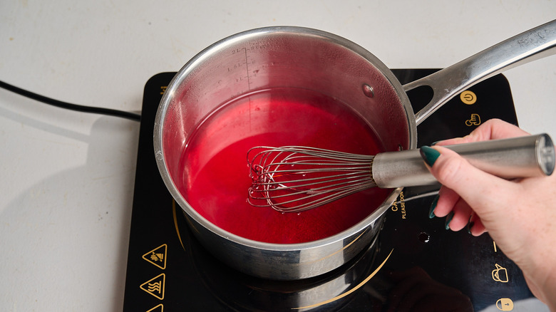 dissolving Jell-O in boiled water