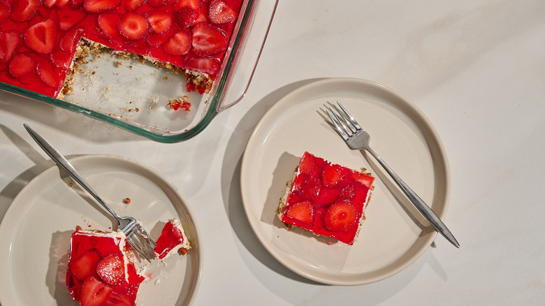 slices of strawberry pretzel salad on plates