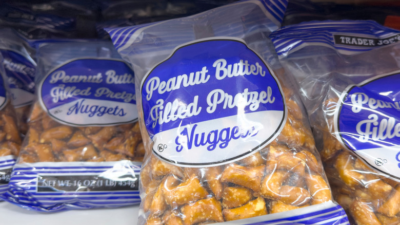 bags of Trader Joe's Peanut Butter Filled Pretzel Nuggets on the store shelf