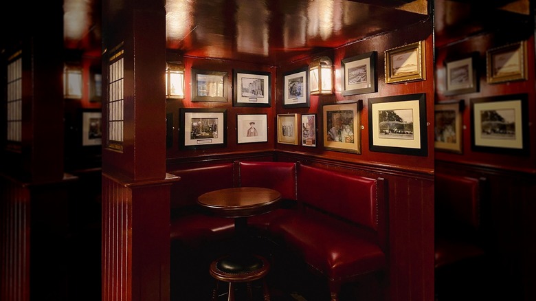 Picture-lined snug at The Old Stand