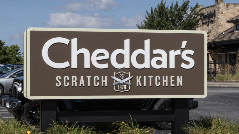 a sign for Chedar's Scratch Kitchen