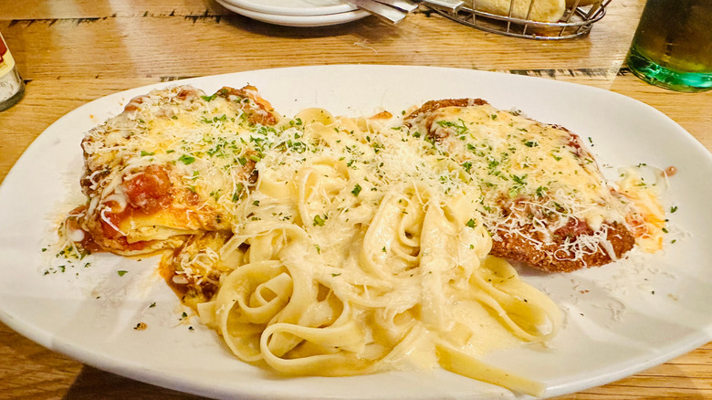 Olive Garden's Tour of Italy on a plate sitting on a wooden table
