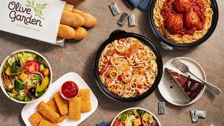 different meals at Olive Garden with breadsticks