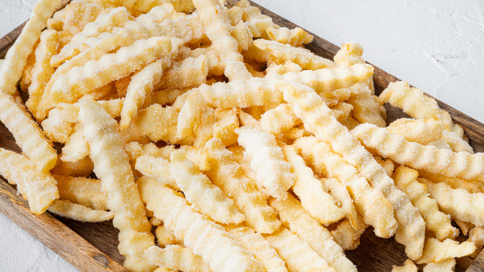 This Canned Ingredient Makes Frozen Fries Taste Way Better - Tasting Table
